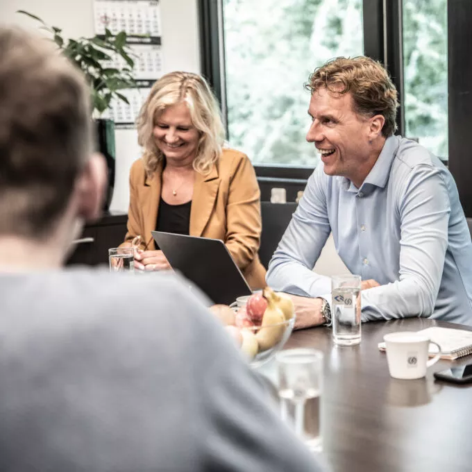 Multiple Twentebelt employees in a meeting at our office
